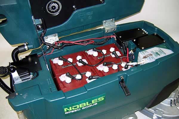 MACHINE INSTALLATION 2. Carefully install the batteries into the battery compartment tray (Figure 1). Arrange the battery posts as shown (Figure 2). UNCRATING MACHINE 1.