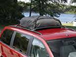 CRRIERS & CRGO HULING Racks & Carriers - Luggage Carrier Weatherproof Luggage Carrier is a heavy-duty, black nylon carrier that is easily installed.