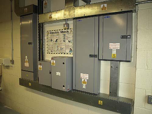 112 PART j I Design of Electrical Installation Systems FIGURE 5.8 A distribution board in use in a college premises. The board incorporates three MCB distribution panels and associated switches.