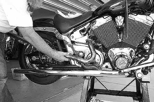 STEP 12 Rear Exhaust Pipe Removal and Installation Unscrew the Oxygen Sensor (4599-0011) located on the backside of the Rear Exhaust Pipe (4599-0014); it is easier to unplug the sensor from