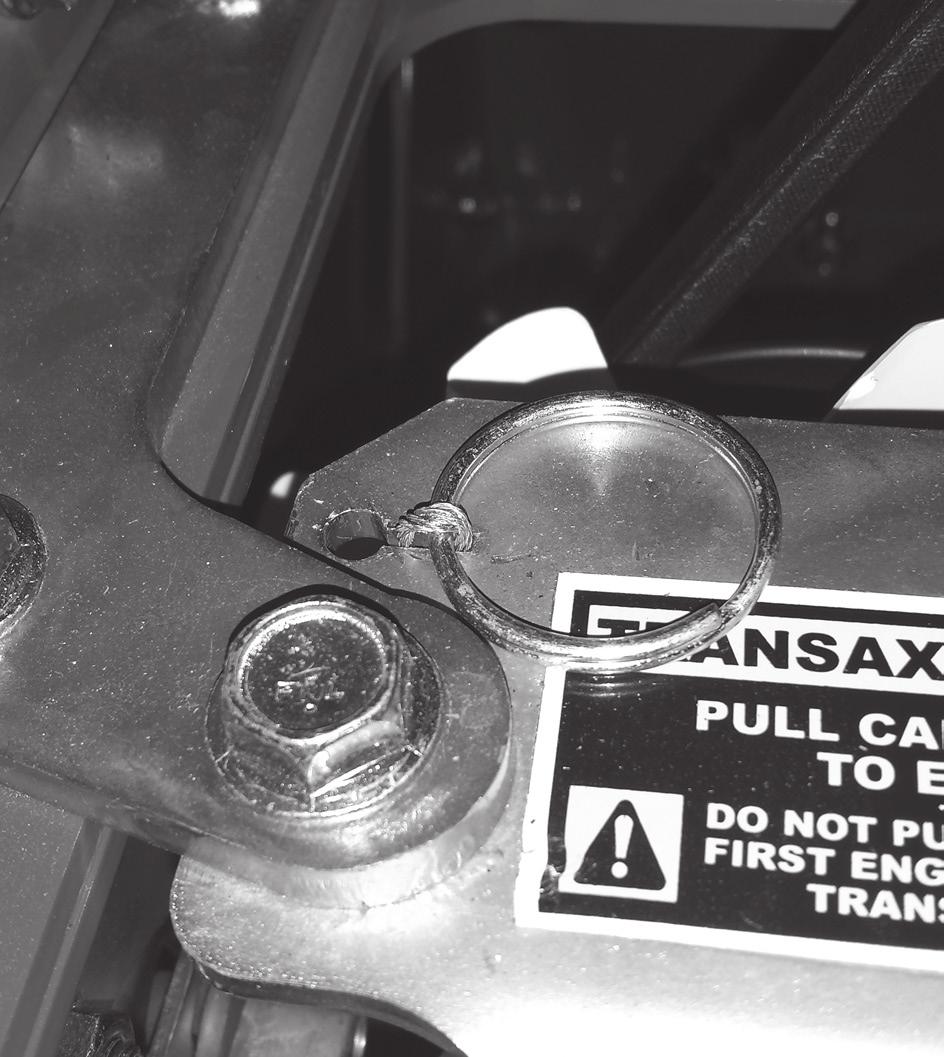 Transaxle Bypass Valve IMPORTANT: DO NOT push or tow machine without first engaging the transaxle bypass valve. Transaxle damage may occur.