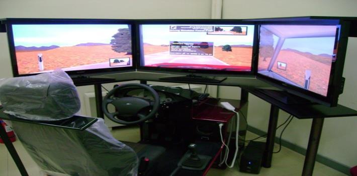 DRIVING AT THE SIMULATOR Concerns the assessment of driving behaviour by means of programming of a set of driving tasks for different driving scenarios Quarter-cab driving simulator manufactured by