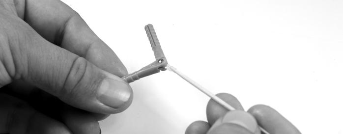 3. 5. *Note - Picture of different model parts shown Using a toothpick or co on swab, apply a small amount of petroleum jelly to the pivot of each hinge.