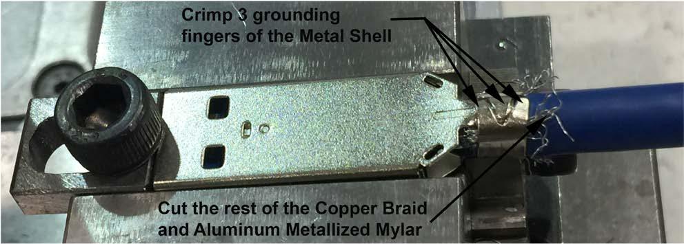 Step 6: Use the crimp tool to crimp 3 grounding fingers of the metal shell portion 2 with portion1 together, and cut the reset of