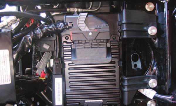 FIG.A 1 Remove the stock seat. 2 Unplug the stock wiring harness from the ECM (Fig. A). FIG.