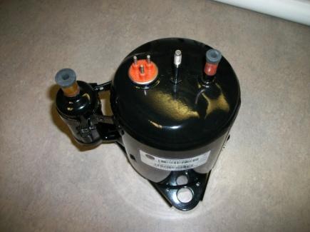O: Compressor: This unit is part of the hermetically sealed refrigeration system.