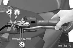 MAINTENANCE AND ADJUSTMENT 135 A. Adjuster B. Locknut C. Clutch Lever Free Play If the free play is incorrect, adjust the lever free play as follows.