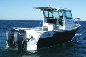 & OCEANRUNNER Standard Features Self-Draining Deck with Scuppers Anchor Well Contoured High Bow Rails Raised