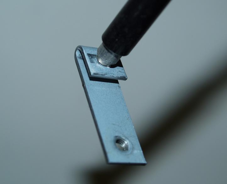 Use needle-nose pliers to disconnect the pre-marked gate wires.