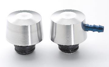 BREATHERS PUSH ON BREATHERS* Available in two designs: One with a dual baffle which virtually eliminates oil blow by; the other with a PCV valve built inside and a 3/8 nipple for vacuum hose