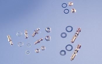 CARBURETOR COMPONENTS CARBURETOR HEAT DISSIPATORS* A lamination of special heat-absorbing, gasket material, separated by layers of aluminum alloy, forces