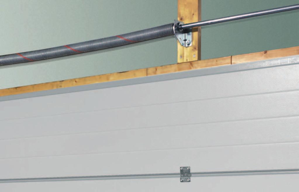A sturdy automatically latching spring disc grips around a solid steel bolt to securely retain the door.