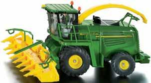 Pneumatic tyres, foldable side mirrors, movable front loader with metal bucket.