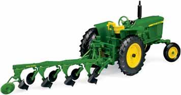 It comes with one round bale and is compatible with 1:16 scale Ertl tractors.