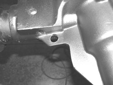 Locate and use FT30229BK Driver Upper Axle mount to check clearance on trimmed area. Make sure that the corner is rounded on the inside of the new cut.