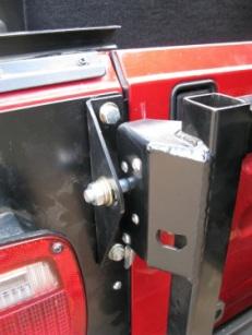 With the latch bracket in place, adjust the position of the pin so that it