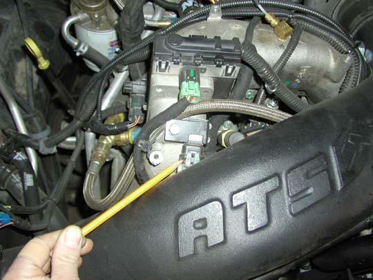 4. MAP Sensor: Find the MAP Sensor fastened on the front of the cast aluminum factory intake tube with one bolt.