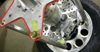If your pulley or sprocket has a center hole with a diameter of approximately 1.980 (50.292mm) then your pulley or sprocket will need to be machined. Install tool as shown using supplied bolts.