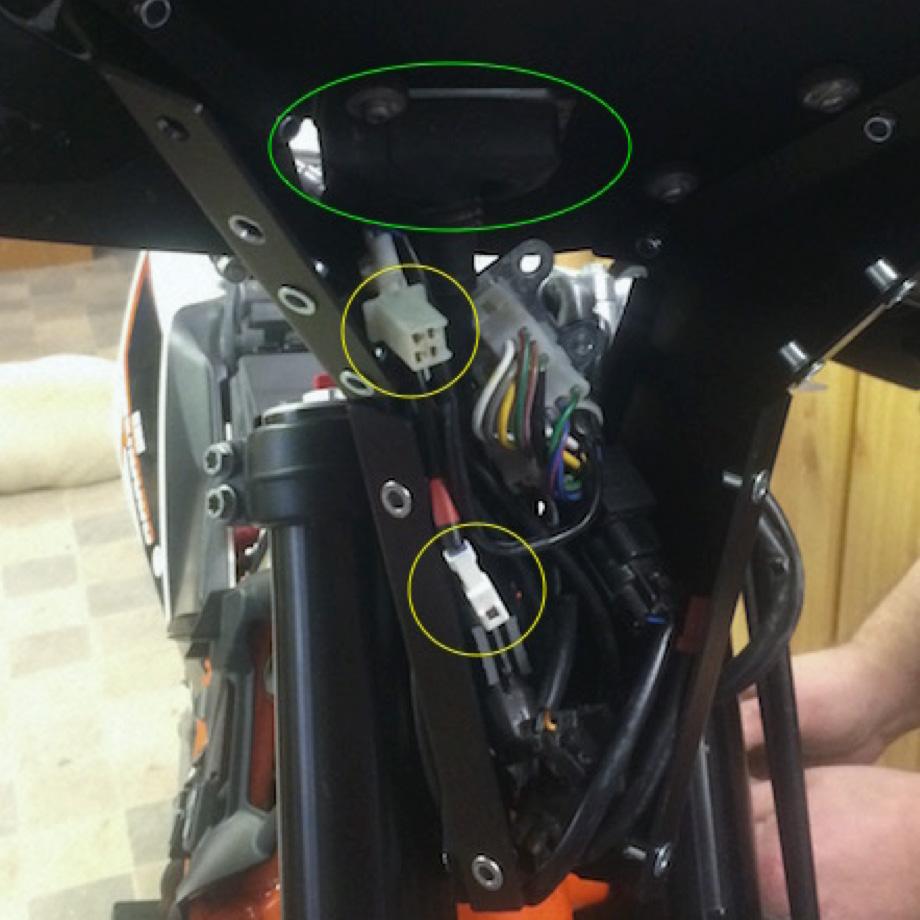 6. - Now remove the OEM speedometer from the OEM plastic holder. Also remove the rubber grommets from the OEM speedometer mount and insert them into the F2 top plate (instrument panel).