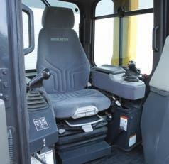 The transmission and steering controls move with the seat for optimum operator comfort. The travel control console is adjustable fore, aft, and for height.