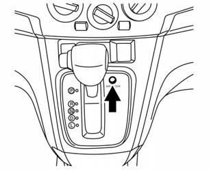 Driving and Operating 9-21 Shift Lock Release If the battery is discharged, the shift lever may not be moved from the P (Park) position even with the foot brake pedal depressed.
