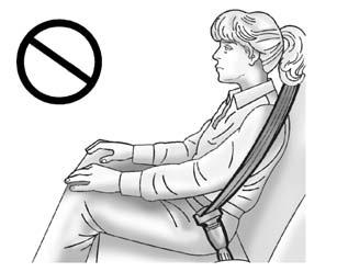 3-32 Seats and Restraints { Warning Never allow a child to wear the safety belt with the shoulder belt behind their back.