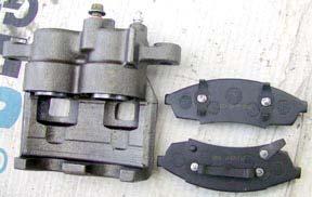 The two piston caliper and the brake pads.