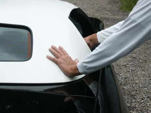 Turn the knobs clockwise to secure the rear of the Hardtop. 3. Push down and forward on the rear of the Hardtop while continuing to tighten knobs. DO NOT over tighten.