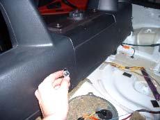 Remove and discard the convertible top covers 2 middle male hooks a.