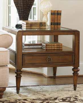 Details like button tufting, nailhead trim, and brass ferrules with casters offer a rich and inviting look.
