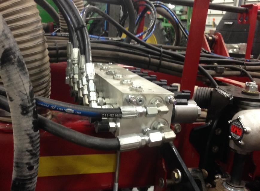10. Connect the corresponding hose to the correct valve channel with a provided expander fitting. 90 degree fittings are provided if needed for cleaner routing of hoses.