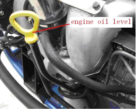 High Low oil level in engin MAX MIN Fig. 11 Fig. 12 a. With the engine warm, put the vehicle on the level ground. b. Shut down the engine; put a collecting oil plate under the engine oil outlet.
