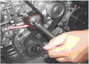 Remove the lower cover of engine timing belt (see Fig. 19). 3.