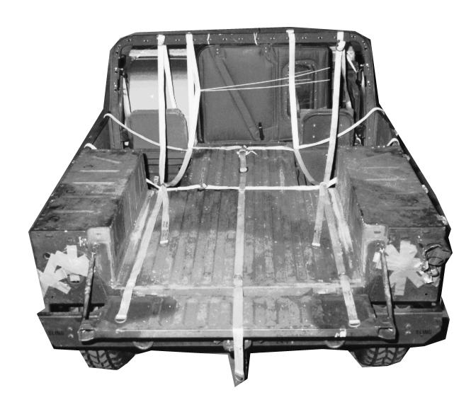 2-7. Preparing the Truck Cargo Bed Prepare the truck cargo bed as shown in Figure 2-8. 4 4 5 1 1 2 3 1 Place a 30-foot lashing through the front tie-down rings from side to side.