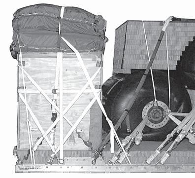 PREPARING AND STOWING CARGO PARACHUTES 4-3. Prepare and stow four G- cargo parachutes as shown in Figure 4-3. Prepare and stow four G- cargo parachutes on the rear equipment box according to FM 4-0.