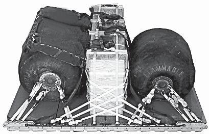 STOWING CARGO PARACHUTES -. Prepare, place, and restrain two G- cargo parachutes according to FM 4-0.0/NAVSEA SS400-AB-MMO-00/TO 3C7--5 and as shown in Figure -.