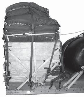 PREPARING AND STOWING CARGO PARACHUTES 4-69. Prepare and stow seven G- cargo parachutes as shown in Figure 4-09.