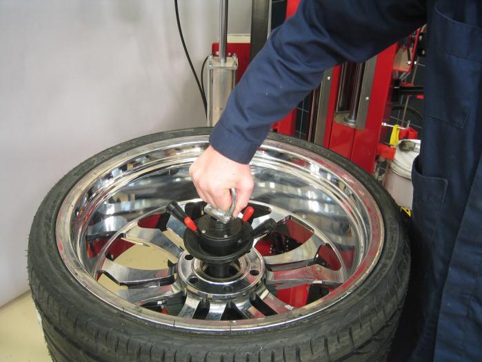 Insert wheel clamp, press down and twist clockwise 1/4 turn to