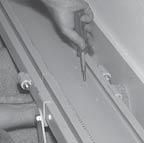 Install the bolts, internal-tooth washers and hex nuts through the joint blocks on both sides of the rail.