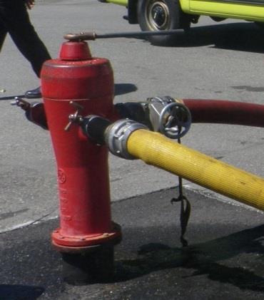 Figure 1: Hydrant Side Port Source: Surrey Fire Service, Training Branch, 2016 In order to support the case for a change of fire hydrant parking setbacks in BC, an evaluation was carried out by