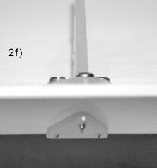 d) Set the horn in place on the aileron, pushing the tips of the screws into the holes in the aileron.