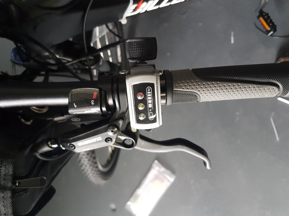 yourself. There is a small allen key on the bottom side of the throttle that tightens the device to the handlbars once the best position has been found. Ensure that the place wash is inserted as well.