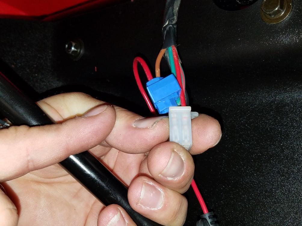 This wire length allows us to create what we call a Service Loop. We will also wire in the turn signal relay harness and the diode harness in this loop.