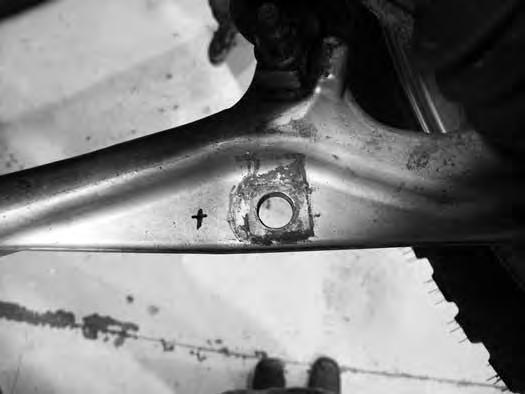 (Fig 32). FIGURE 32 66. Locate the original sway bar link mounting hole on the lower control arm.