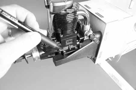 Step 3 Check the position of the carburetor in relationship to the engine. It should match the photo.