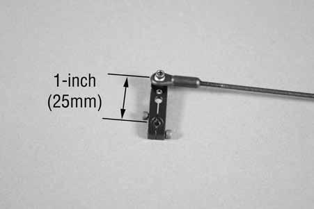 Step 2 Thread a ball end and clevis on a 5 1 / 2 -inch (146mm) threaded pushrod. Thread both ends equally on the pushrod.
