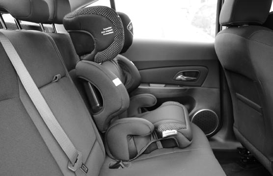 Using your safety seat SECURING YOUR CHILD IN VEHICLE Place the booster seat firmly against the back of a forward facing vehicle seat equipped with a lap and shoulder belt only.