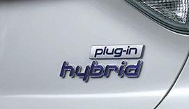 Identifying a Hyundai Plug-in Hybrid vehicle Plug-in Hybrid badge on Trunk and Blue Drive badge on side of Vehicle The Hyundai