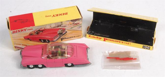 1922 Dinky Toys, 100, Lady Penelope's FAB1, nonfluorescent pink body, clear sliding roof, Lady Penelope and Parker figures apparent, sold with 4 red harpoons, jewelled headlights and mascot intact, 1