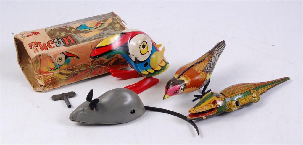 3212 Tinplate Toys to include; sparking crocodile (VG), pecking bird, Tri-ang plastic mouse (tail not original), and a Spanish Chim Jugete No.